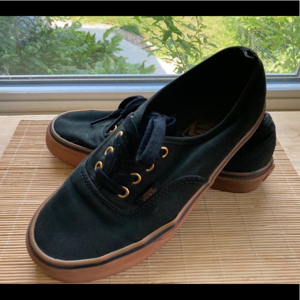 Vans black sneakers.